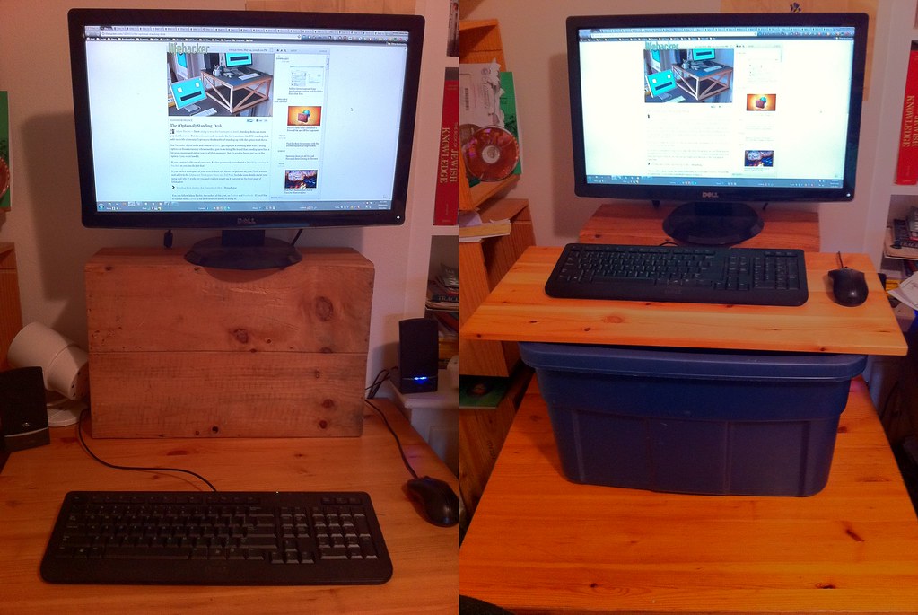 Monitor and keyboard on a wooden desk riser setup
