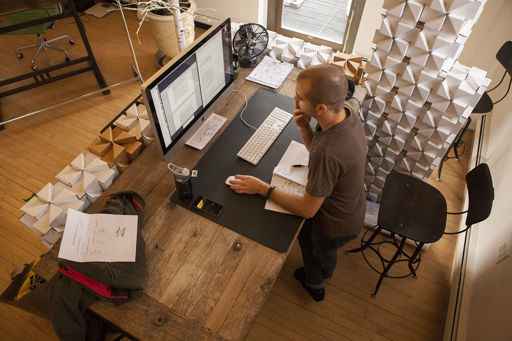 Remote worker at a desk with laptop and call-friendly workspace nearby